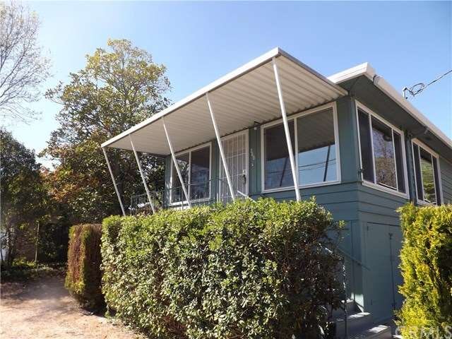Look at all the great windows! Sweet porch!