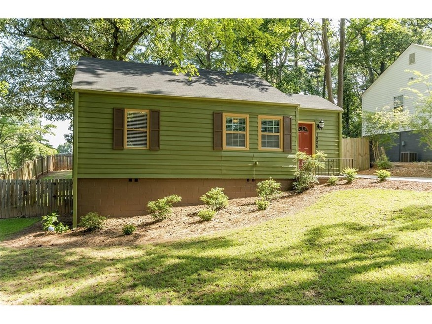 Large corner lot with professional landscaping!