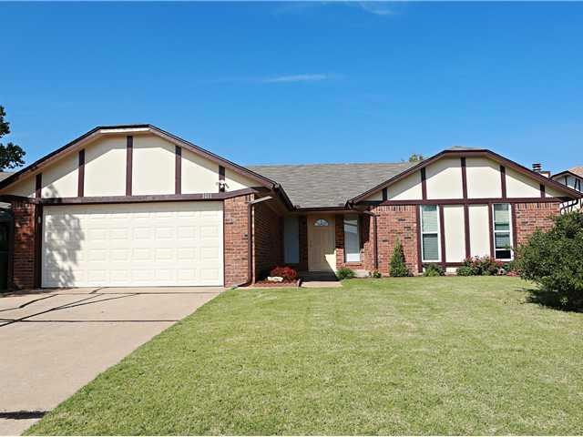 Exterior Front. Full sprinkler system & back yard 