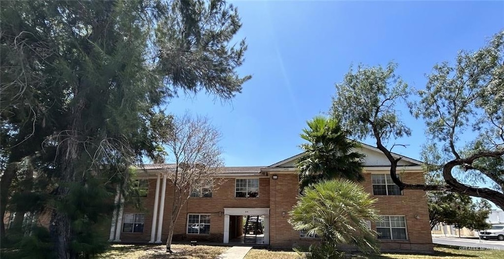 View of front of house featuring brick siding