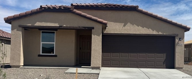 View of front of property featuring a tiled roof,