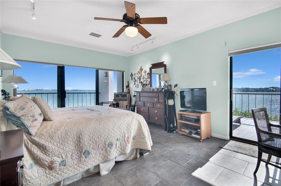 Gorgeous Primary bedroom with lakefront views from
