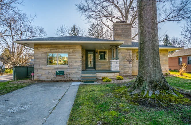 Classic limestone anchors this fully renovated hom