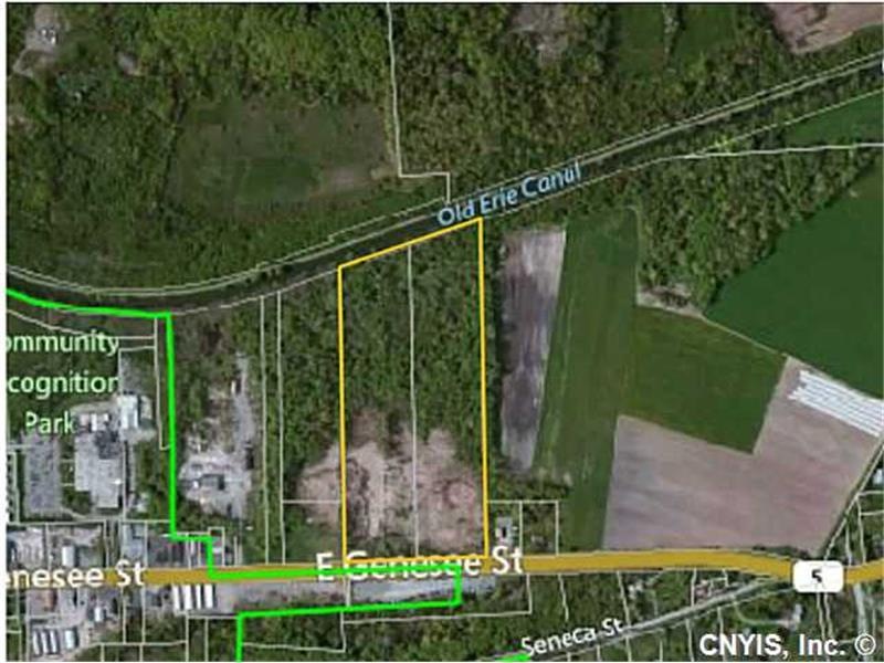 Aerial View. Yellow boundary is property.Green is 