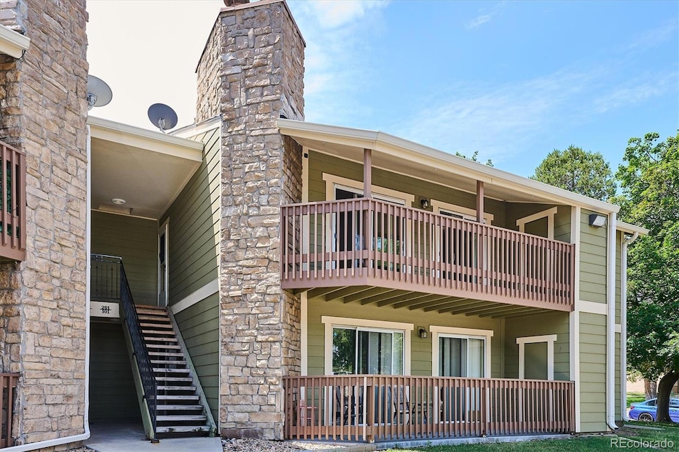 Upper Unit with Balcony and Outside Stair Entrance