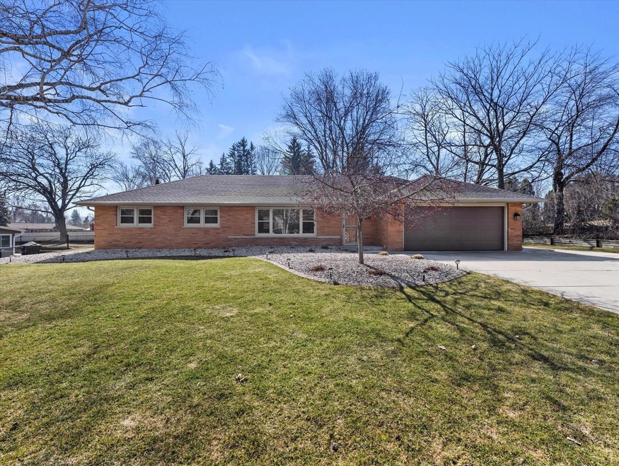 Brick ranch with additional side parking