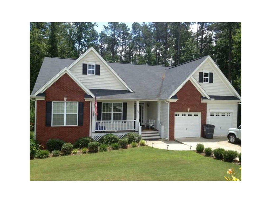 Exterior Front. Summertime photo of this gorgeous 