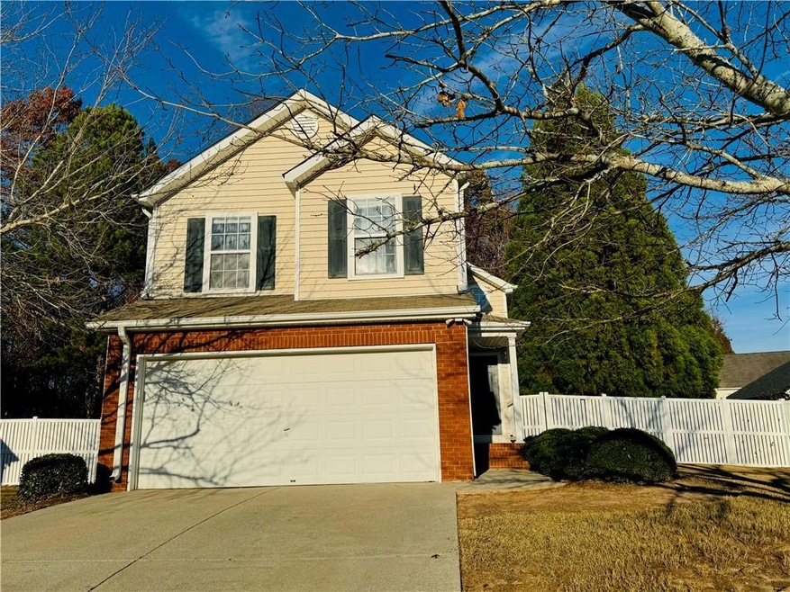 View of front property featuring a garage
