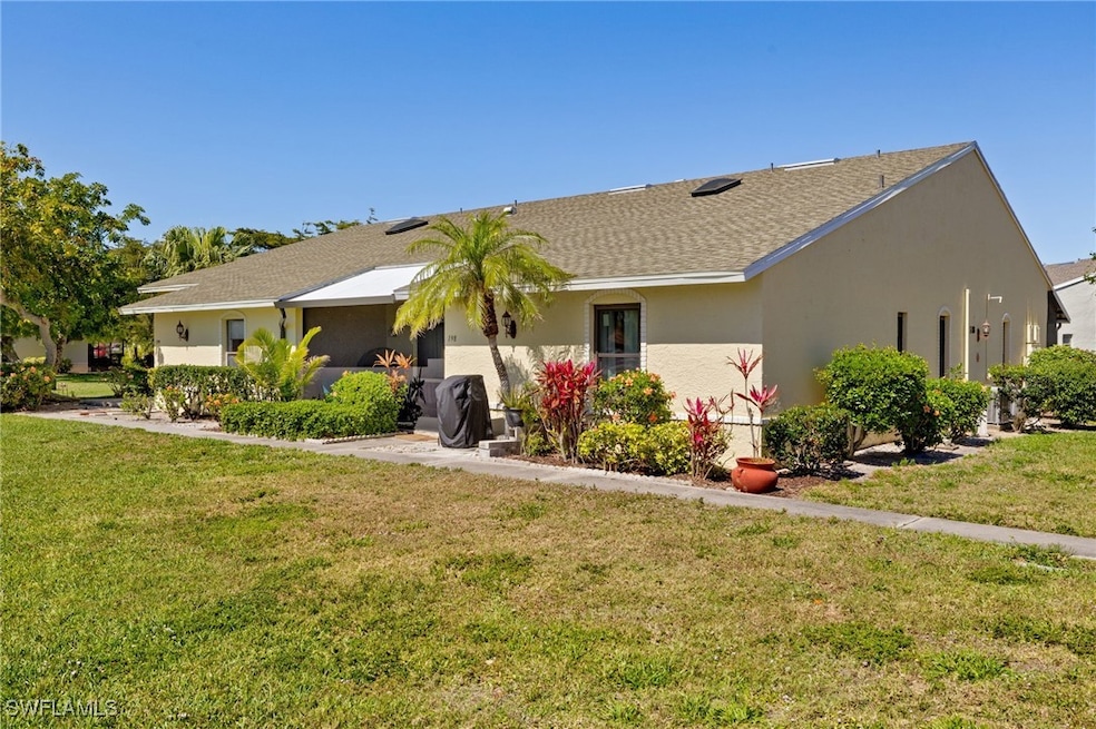 View of front of house featuring stucco siding, ro