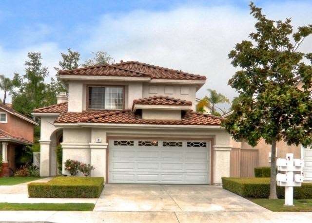 Beautiful curb appeal welcomes you to this former 