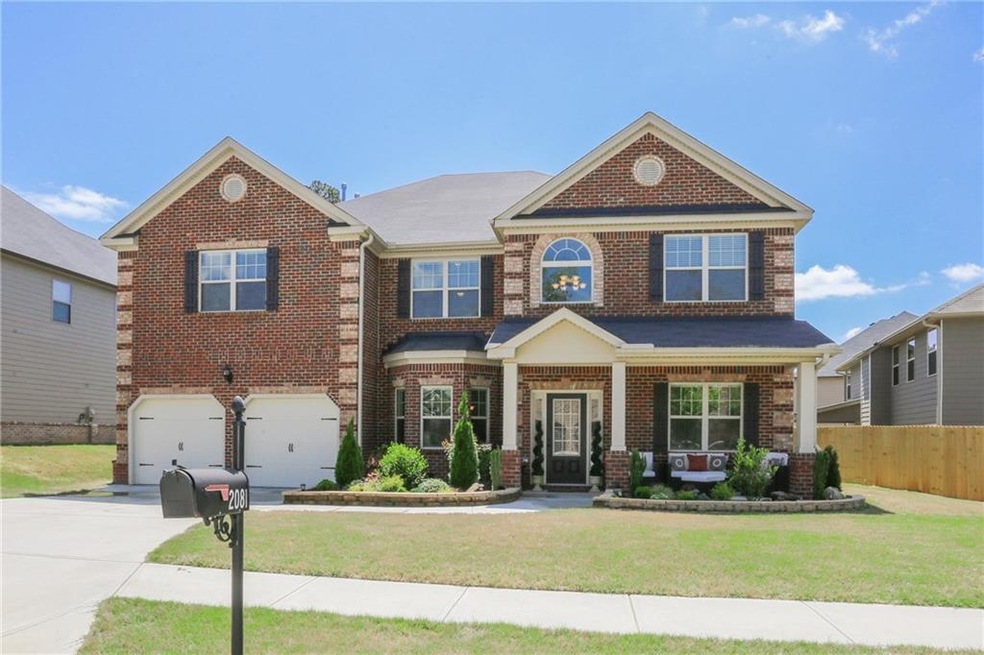 Spacious brick front home with inviting covered fr
