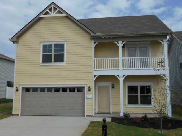 One of Ole South's newest Craftsman Style home  featuring: sod front yard, landscaping pkge., iron mail box, walk out balcony upstairs.