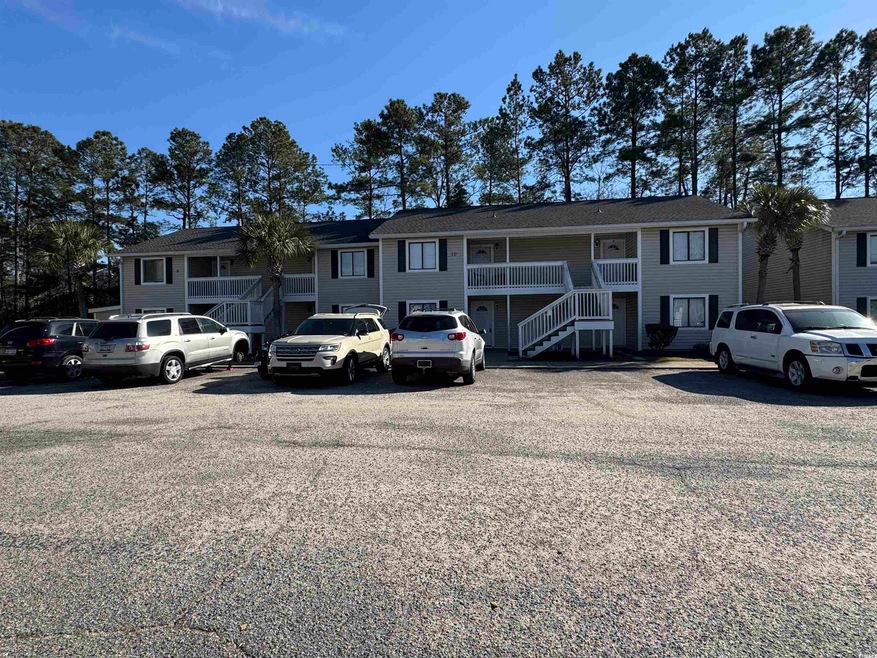 View of front of property featuring stairway