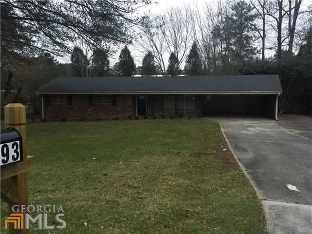 Front view of home. Large, level front yard and dr
