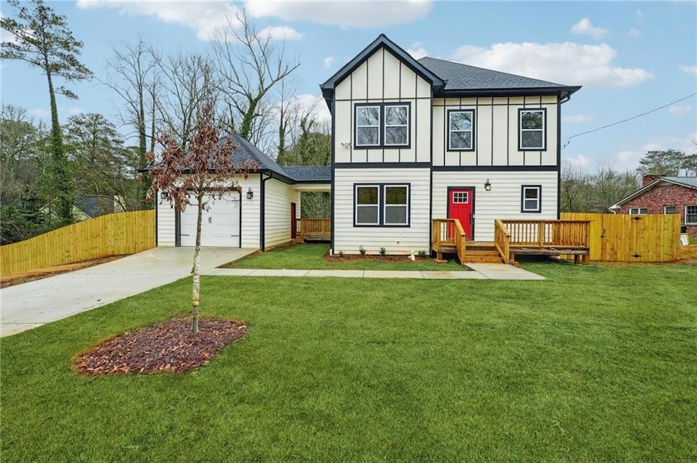 View of front facade featuring concrete driveway, 