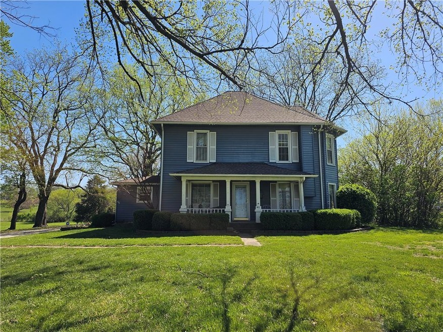 705 N Madison St, Raymore, MO 64083 - photo 1