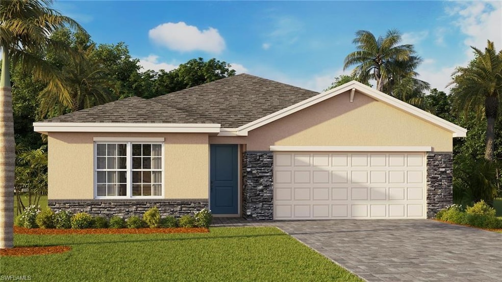 Single story home with a garage and a front yard