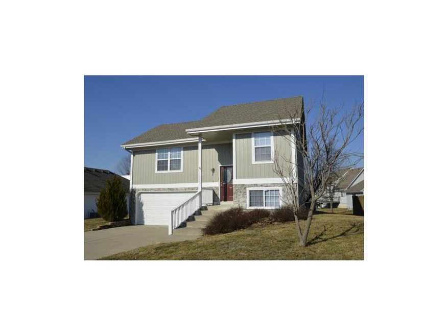 Home sits on spacious park-like lot.