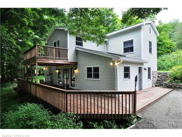 Exterior Front. Balcony off master bedroom and eno