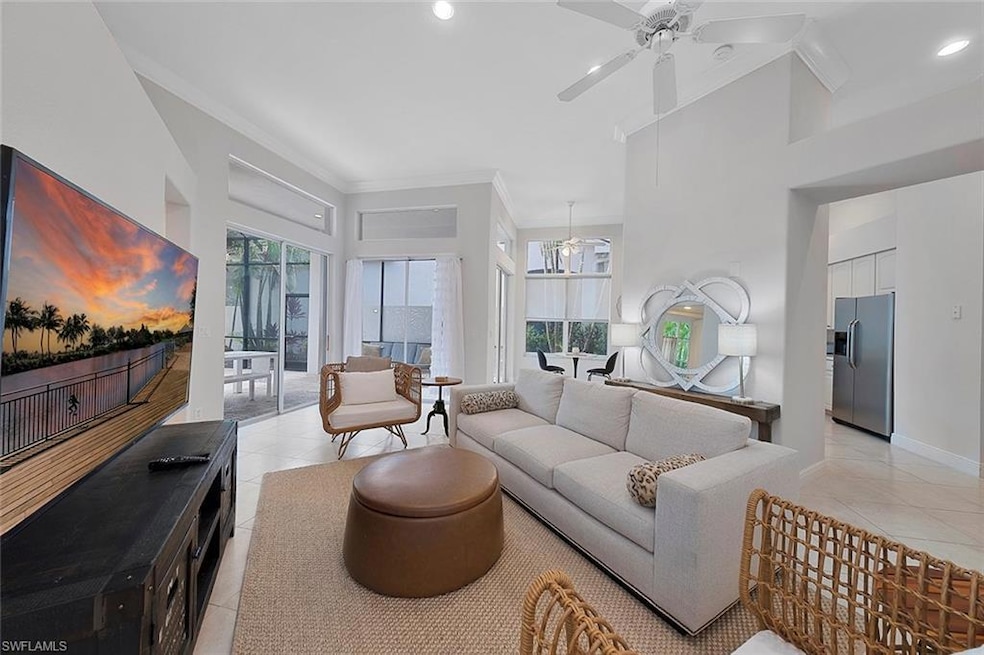 Tiled living room featuring a wealth of natural li