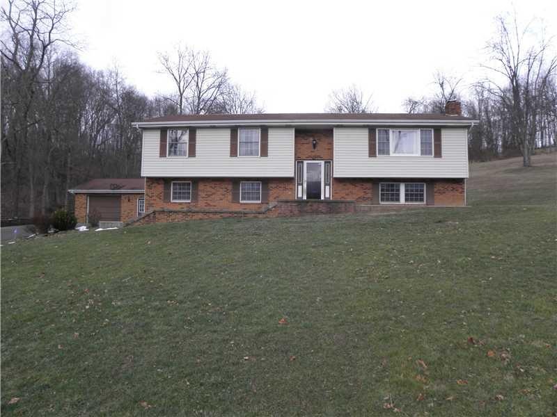 Exterior Front. Spacious Brick Contemporary Split 