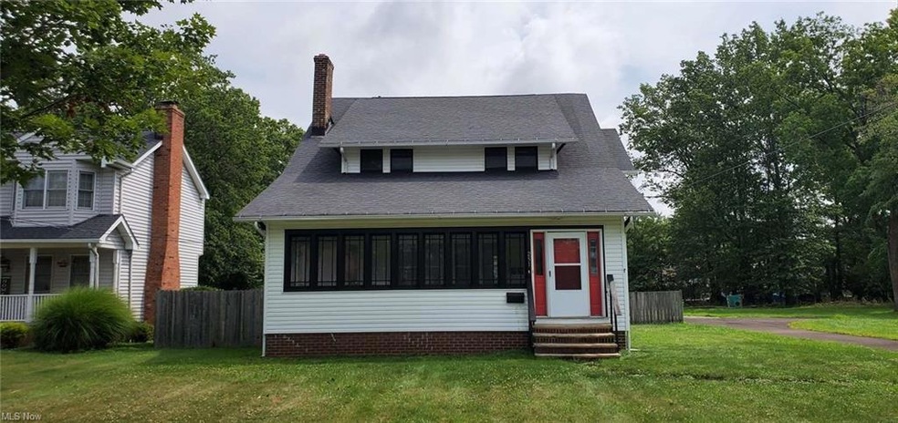 View of front of property with a front lawn