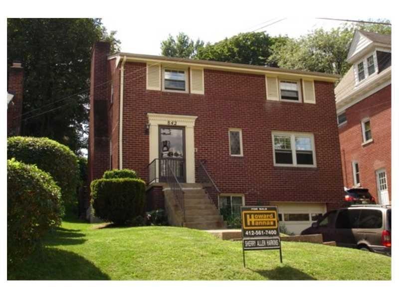 Exterior Front. Charming red brick Colonial style 