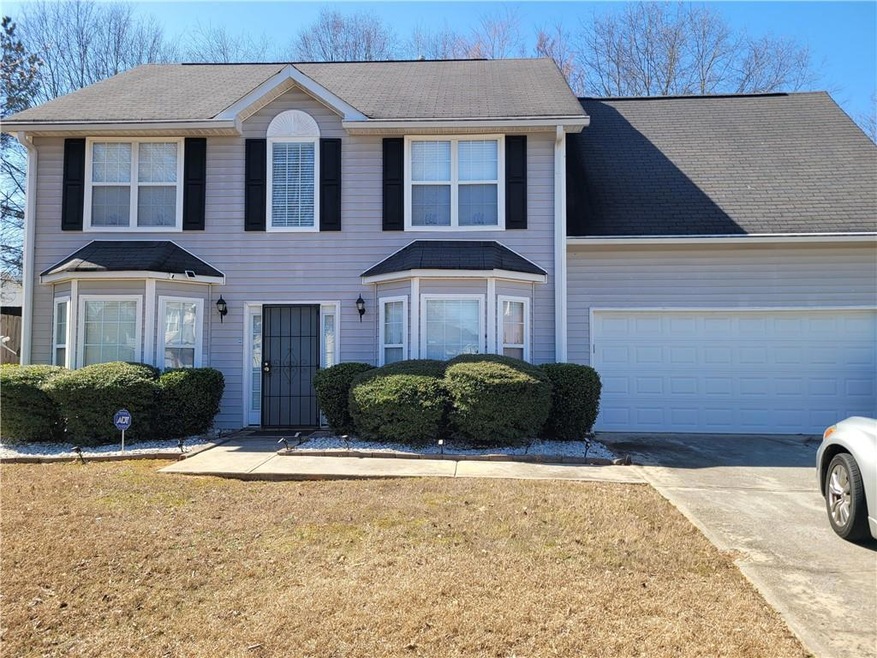 View of front of house with a front lawn
