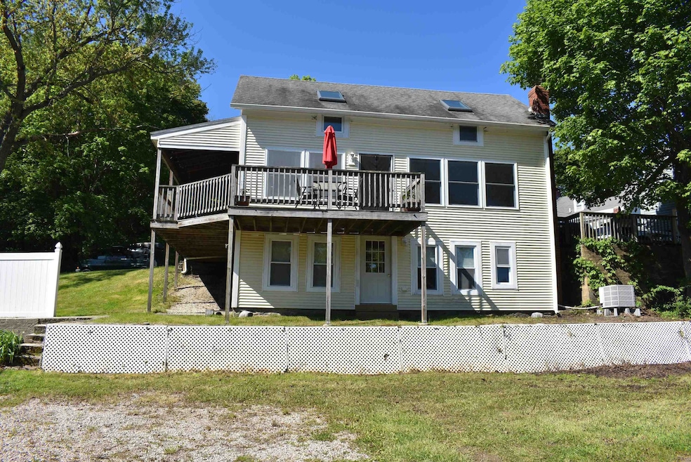 Back of house facing the Lamprey River