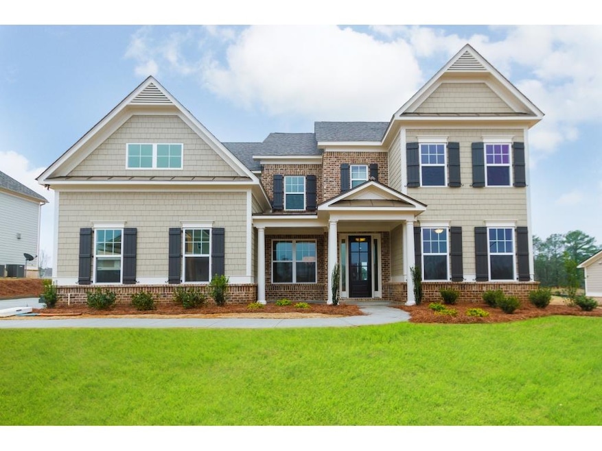 The Primrose on homesite 83 has a brick and shake 