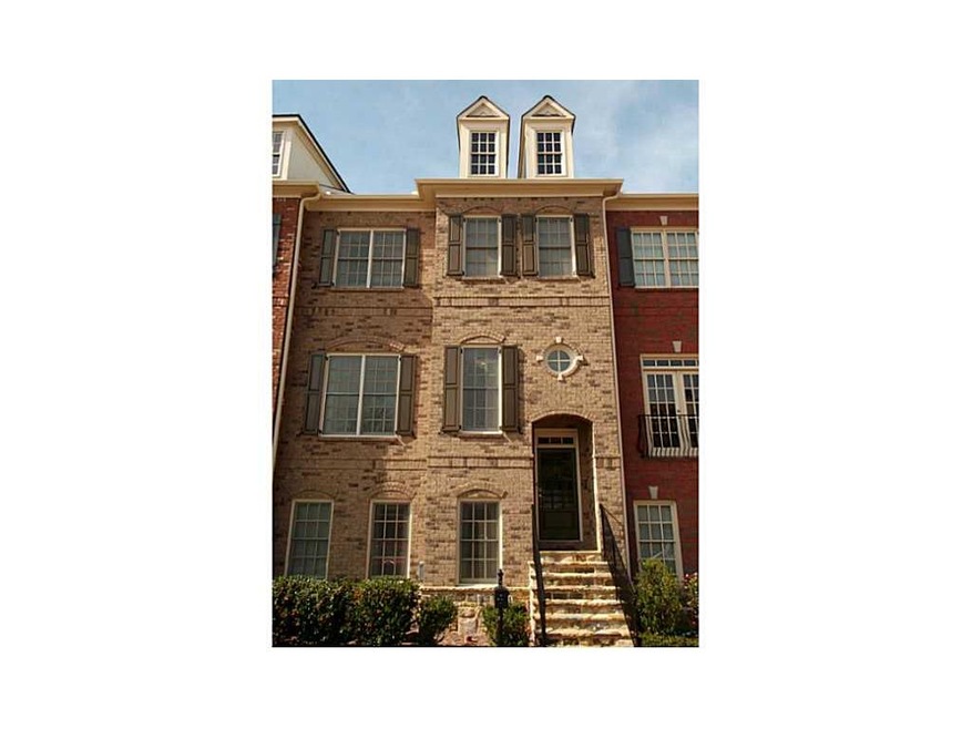 Exterior Front. An Elegant Townhome at Kennesaw Mo