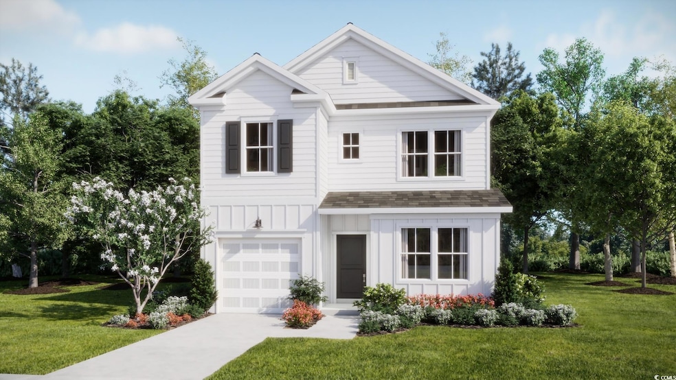 View of front of property with a garage and a fron