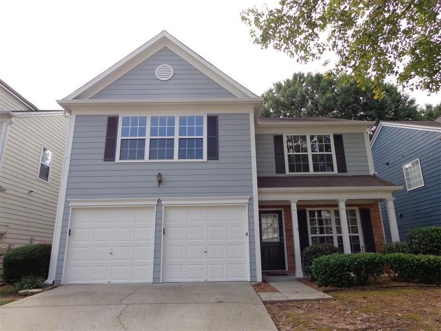View of front of home featuring a garage