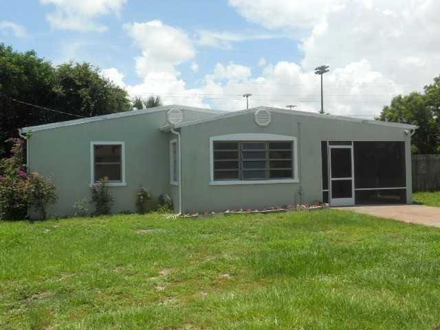 2215 NE Arch St, Jensen Beach, FL 34957 - photo 1