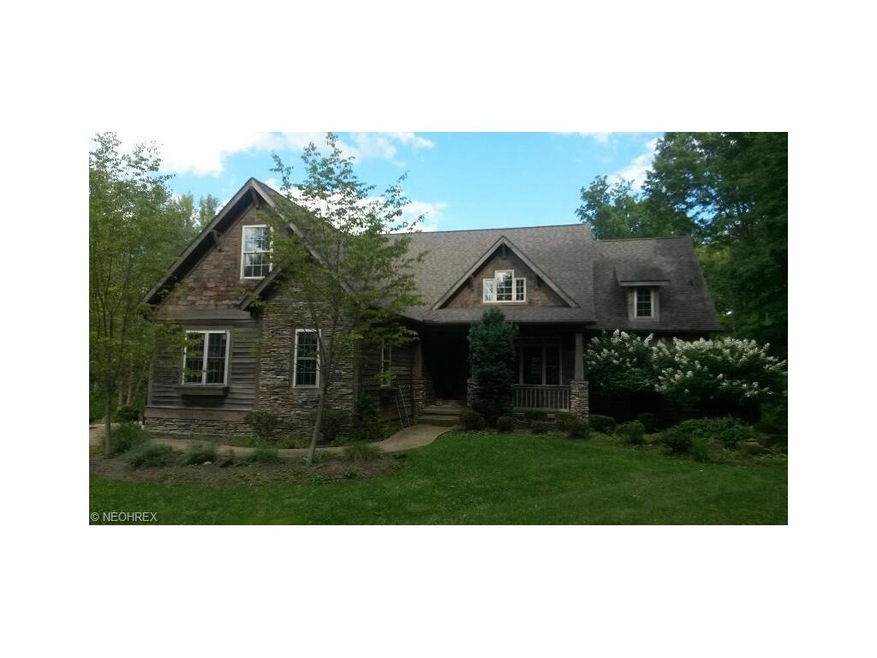 Front view. Beautiful stone and woodwork!