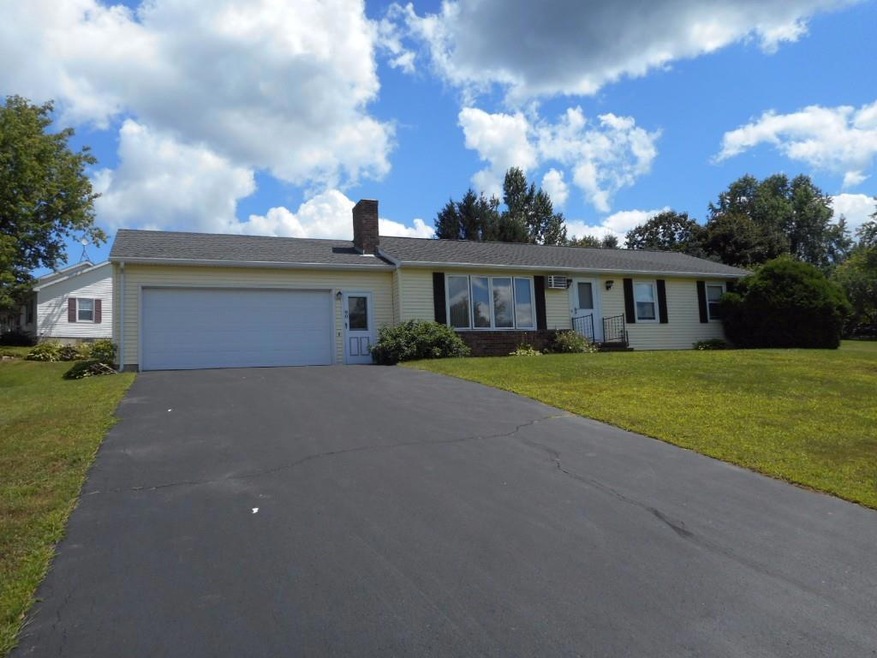 Front of home as viewed from road.