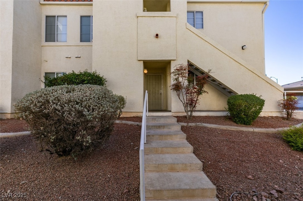 View of front of property featuring stucco siding