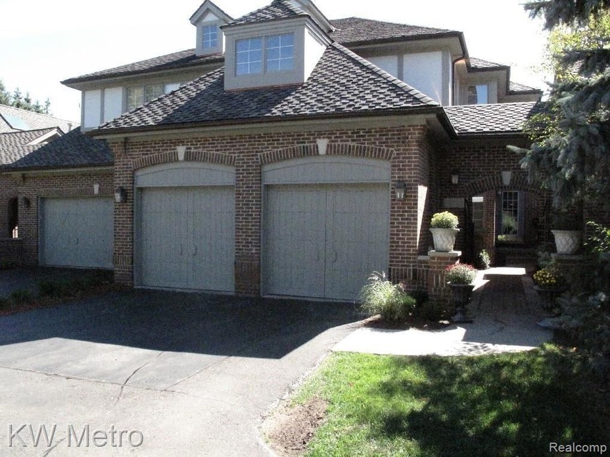 Front elevation with two car attached garage and f