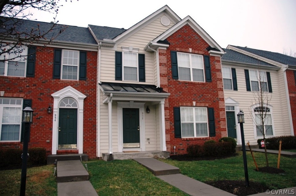 Welcome to 952 Wellston Court with brick & vinyl f