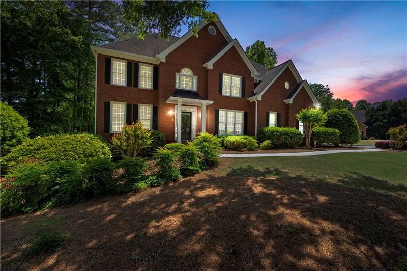 Beautiful luxury three sided brick home.
