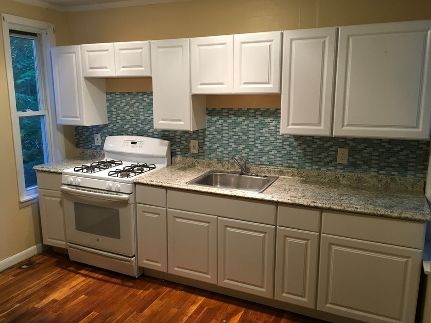 132 Bartlett St unit 1, Lowell, MA 01852 - photo 1