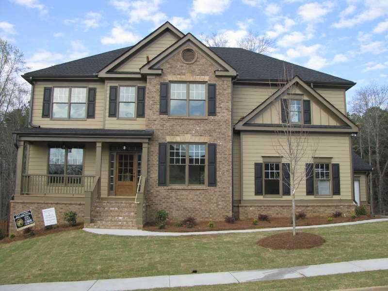 Exterior Front. House is under construction and ex
