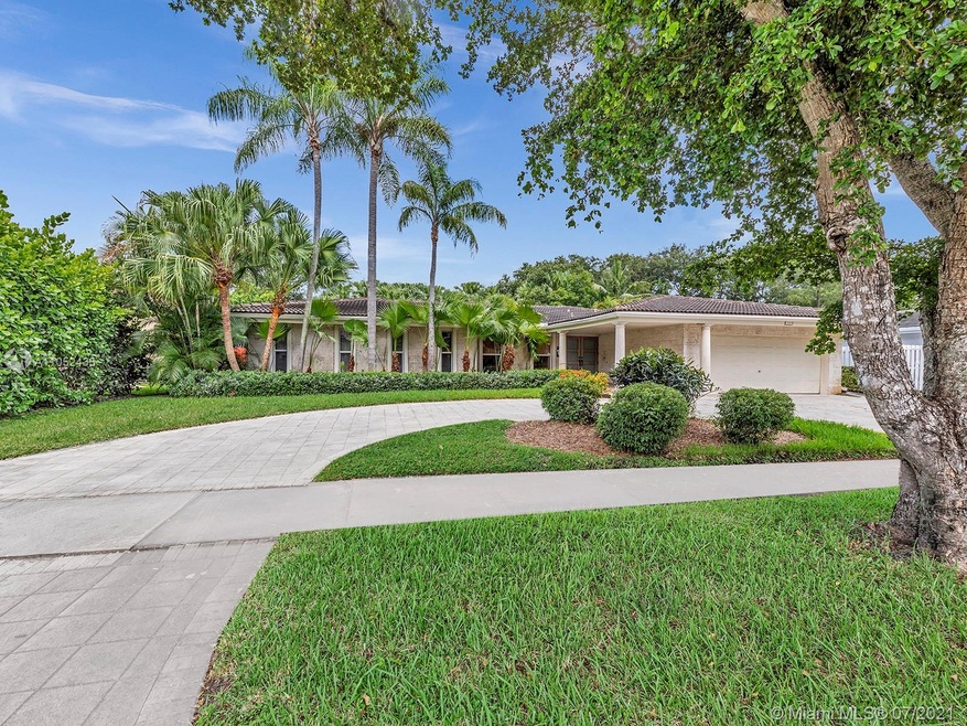 THIS MAJESTIC HOME FEATURES CIRCULAR DRIVEWAY AND 