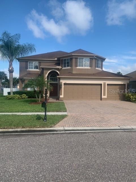 MAGNIFICENT HOME WITH ENHANCED LANDSCAPING ON ALL 