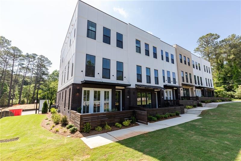 TPG's Modern Upscale Brick townhome with fenced fr