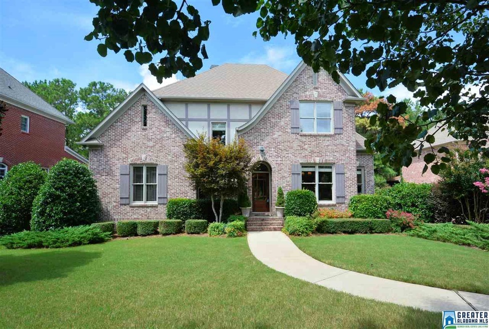 Fine custom brick home in gated Highland Lakes