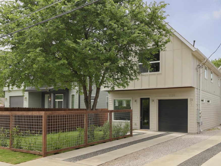 View of front of home featuring board and batten 