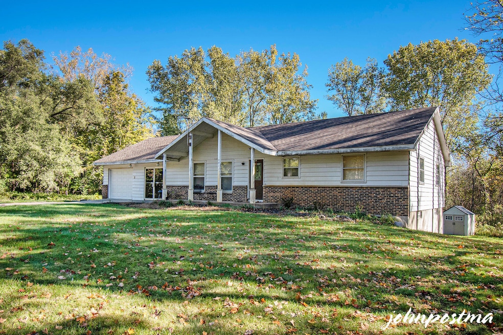 970 Buttrick Ave SE, Ada, MI 49301 - photo 1