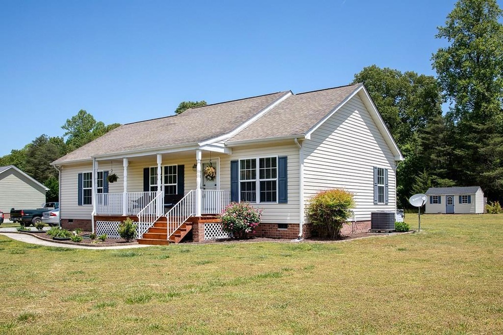 406 Pond Dr, Dunnsville, VA 22454 - photo 1