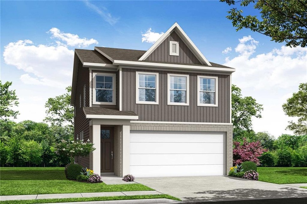 View of front facade featuring a front yard and a 
